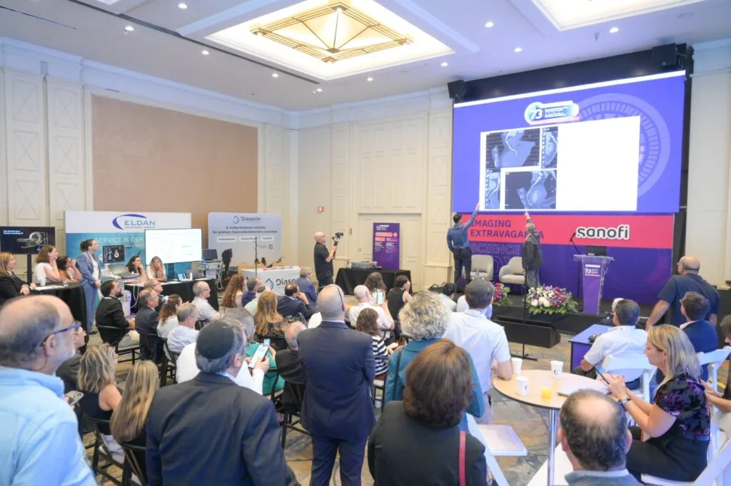 Imaging Extravaganza audience and stage at the Israel Heart Society Annual Meeting